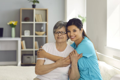 senior woman together with her home care nurse